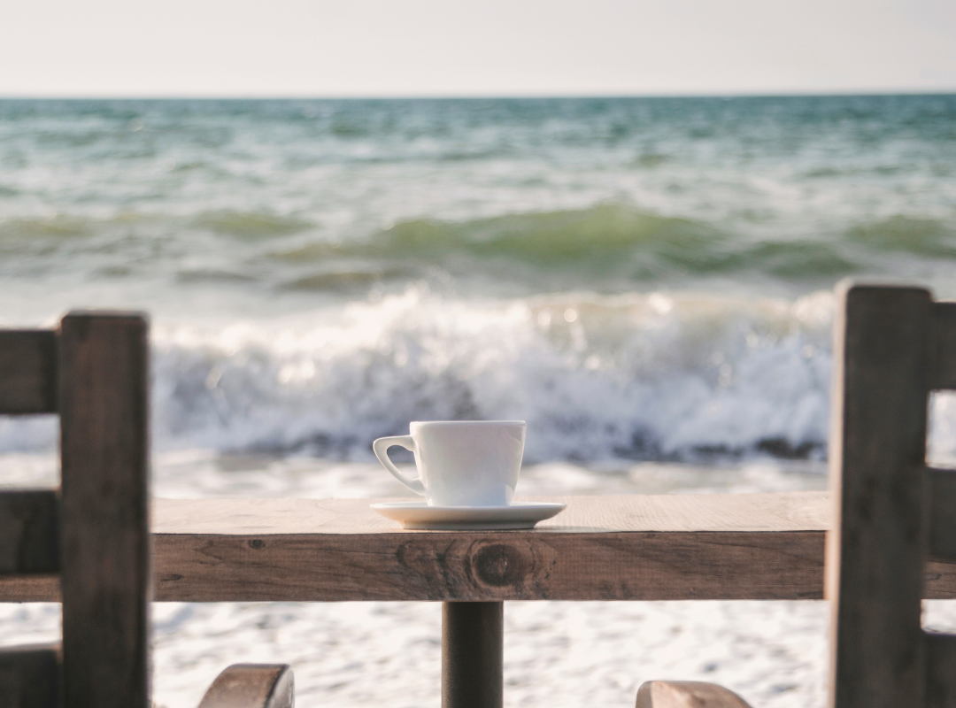 Tea cup by the ocean